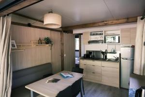 Chalets Lodge avec SPA privatif - Foret et Lac : photos des chambres